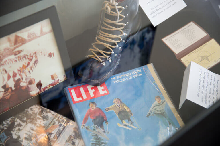 Art exhibition artifacts, including magazine and boot.