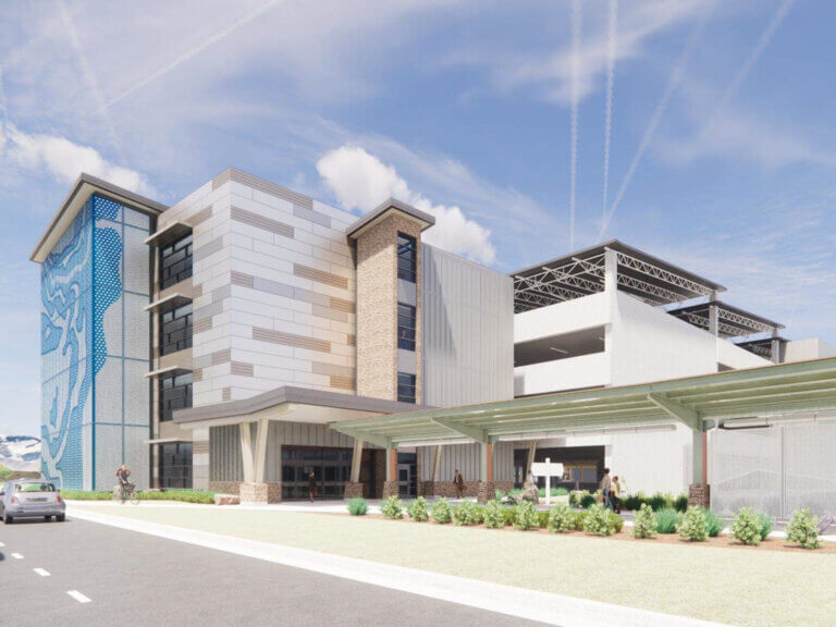 Ground Transportation Center exterior rendering with walking path from RNO and architectural elements.