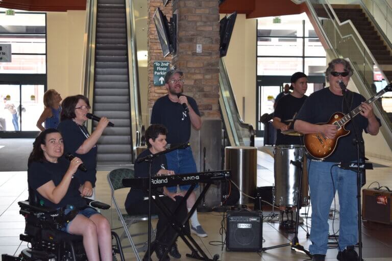 The Note-Ables performing at the airport.