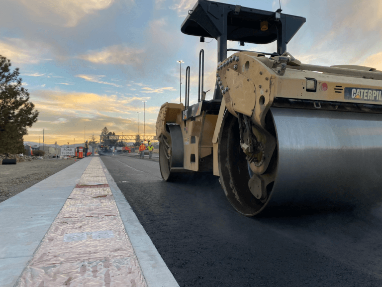 Construction equipment roller on pavement