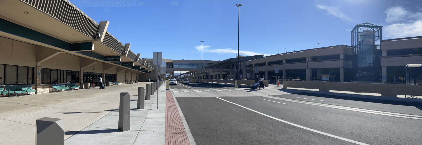 Landscape view of airport front curb and loop road.