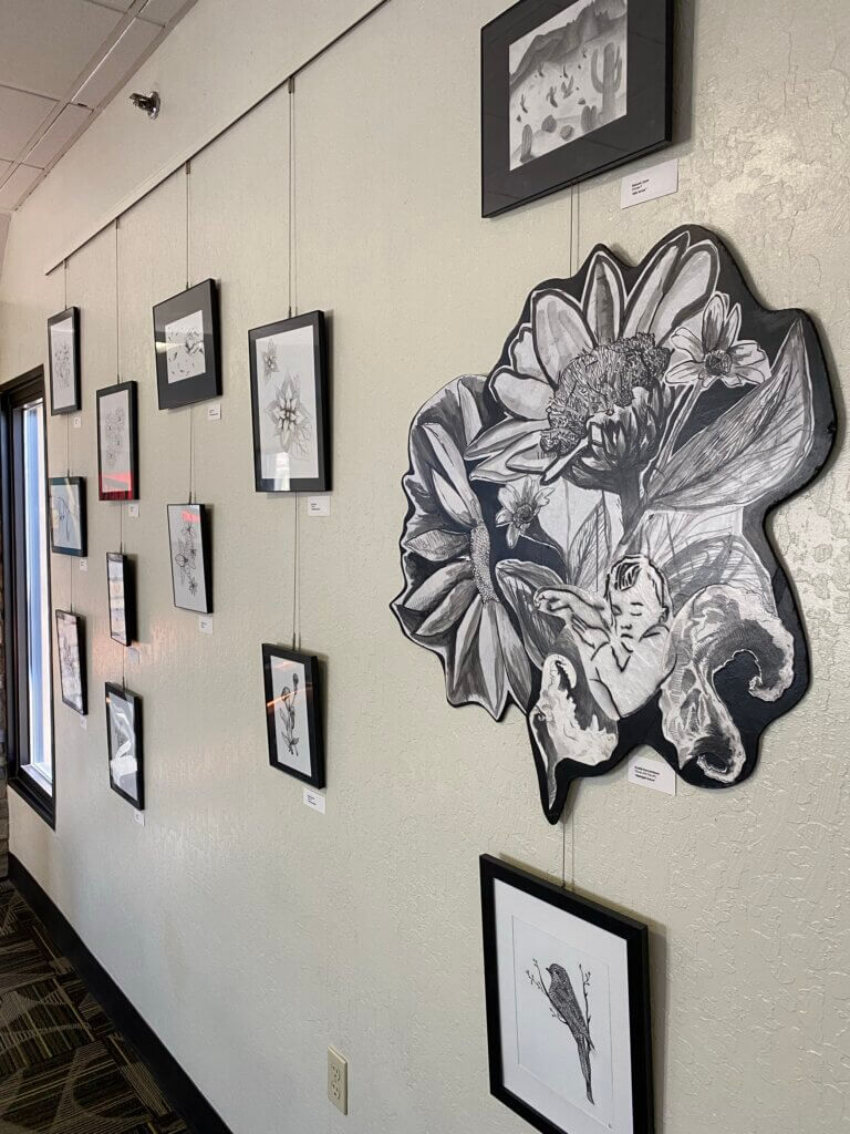 Sage Ridge exhibition at RNO. Gallery wall displaying black and white artwork.