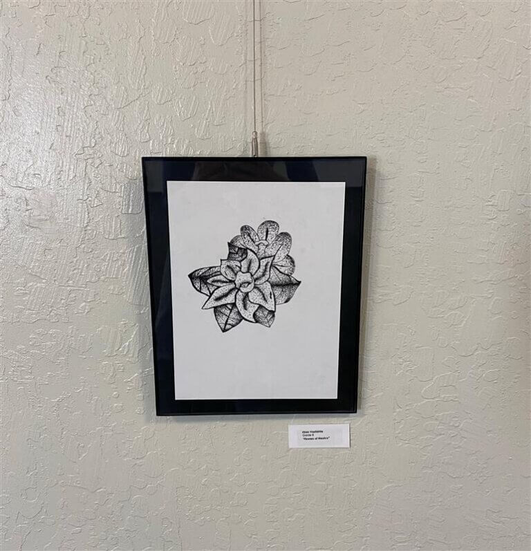 Black and white drawing of a flower.